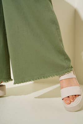 Beli İp Bağlamalı Paçası Yırtık Detaylı Pantolon Çağla Yeşili - Thumbnail