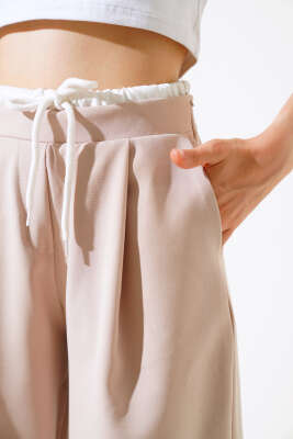 Bel Garnili Pantolon Bej - Kadın Giyim Modelleri