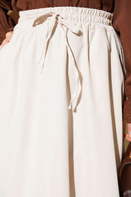 Bel Lastikli Cepli Tensel Etek Bej - Etek