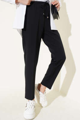 Beli Lastikli Dar Paça Pantolon Siyah