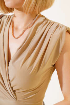 Çıtçıtlı Kolsuz Body Latte - Kadın Giyim Modelleri