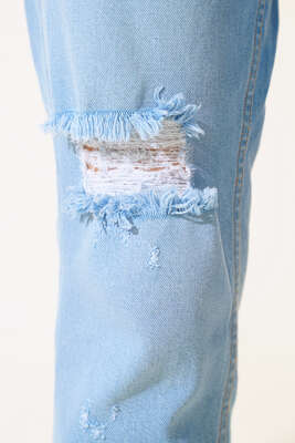 Dizi Yırtık Kot Pantolon Mavi - Kadın Giyim Modelleri