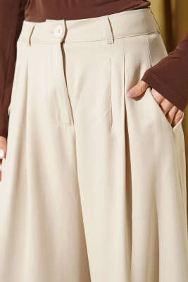 Geniş Paça Pileli Salaş Pantolon Bej - Kadın Giyim Modelleri