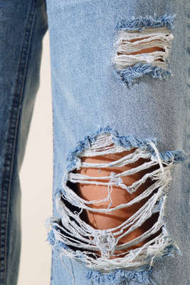 Geniş Paça Yırtık Kot Pantolon Açık Mavi - Kadın Giyim Modelleri