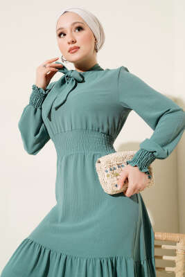 Önden Bağlama Detaylı Lastikli Elbise Çağla Yeşili - Tesettür Elbise