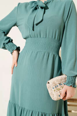 Önden Bağlama Detaylı Lastikli Elbise Çağla Yeşili - Tesettür Elbise