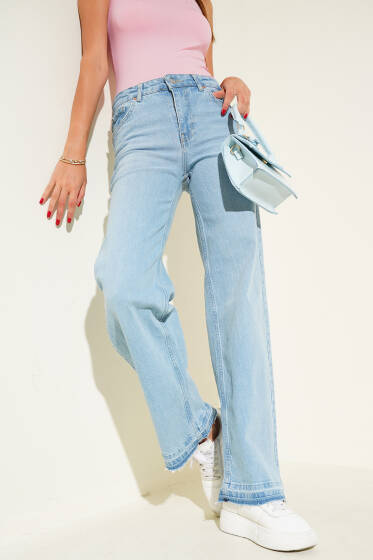 Paça Püskül Detaylı Kot Pantolon Açık Mavi - Kadın Giyim Modelleri