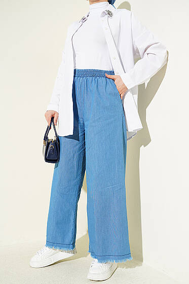 Paça Püsküllü Cepli Salaş Kot Pantolon Açık Mavi - Yılın Fırsatı