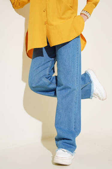 Paçası Püsküllü Orta Mavi Pantolon - Kot Pantolon