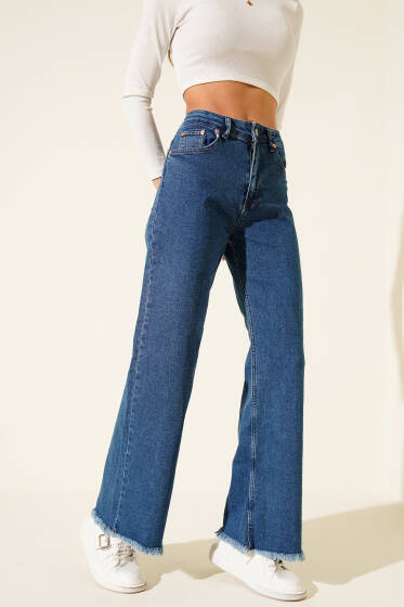 Püsküllü Paça Kot Pantolon Orta Mavi - Kadın Giyim Modelleri