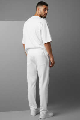 Yaka Lazer Kesim Yan Yırtmaçlı Erkek Eşofman Takımı Beyaz - ERKEK İKİLİ TAKIM